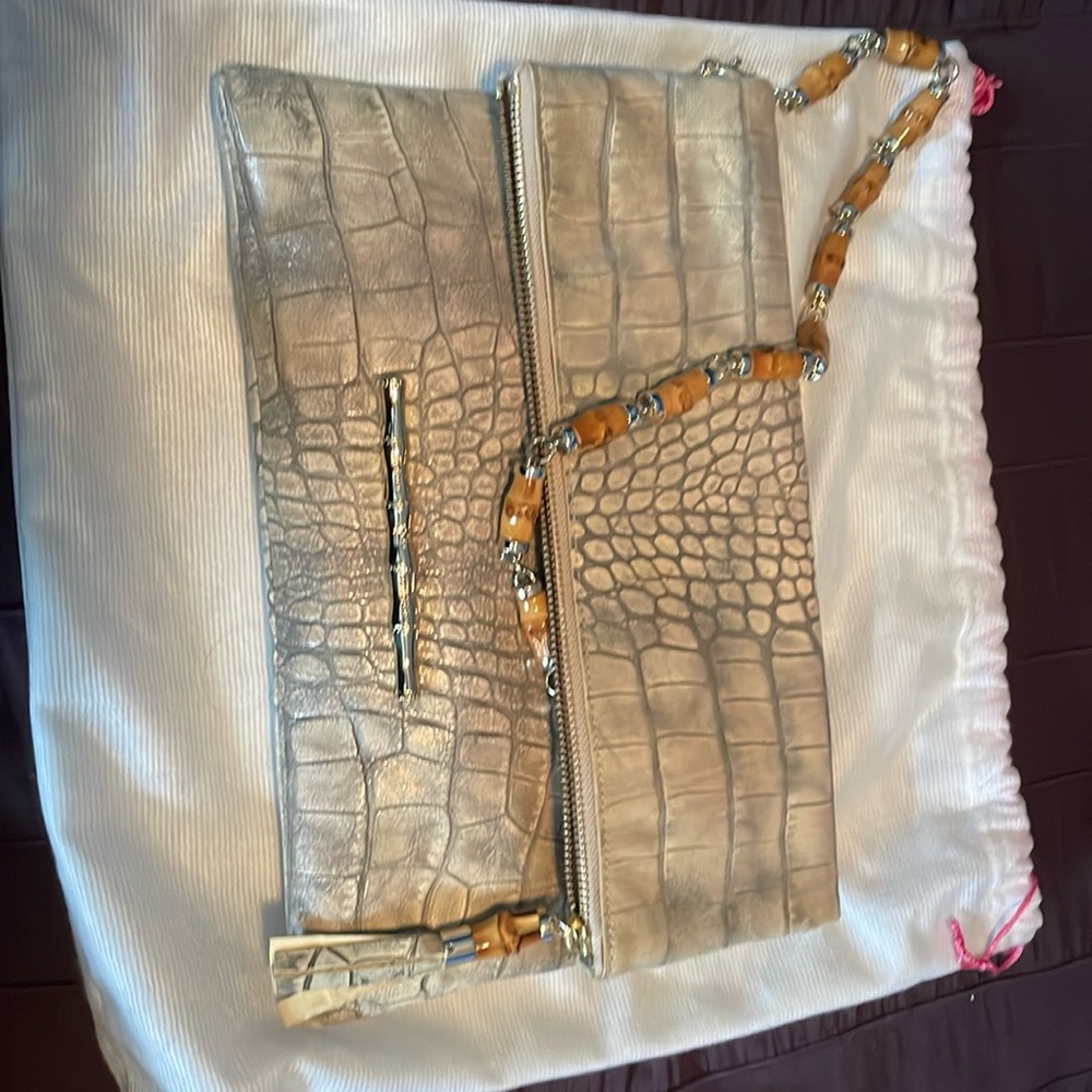 Elaine Turner gold flap bag